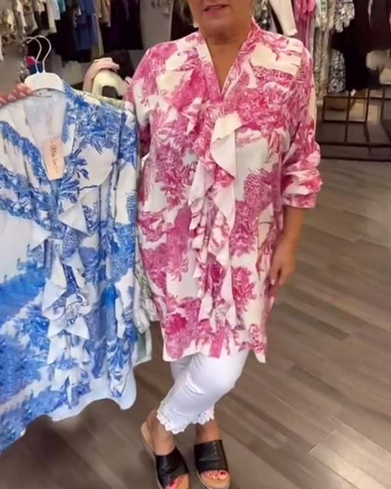 Afslappet bluse med flæser og print