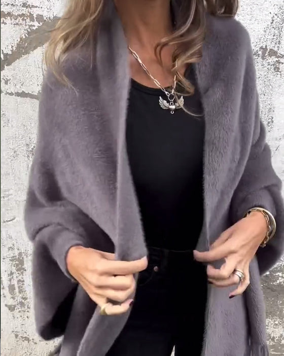 Pelsfrakke med frynser