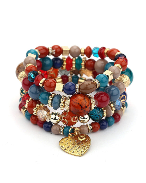 Lagdelt hjerteperlearmbånd