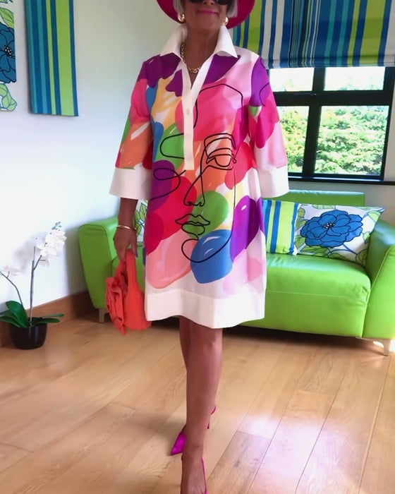 Farverig kjole med portrætmotiv