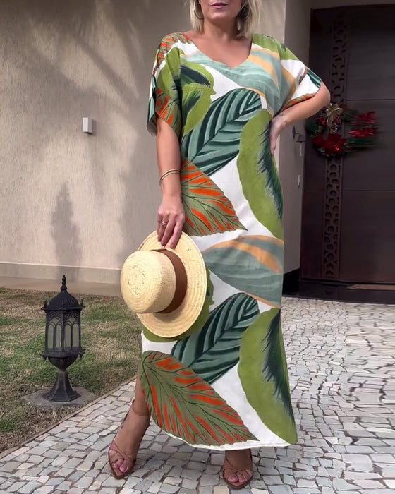 Afslappet kjole med korte ærmer og botanisk print