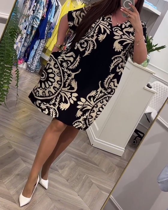 Knælang kjole med retro print