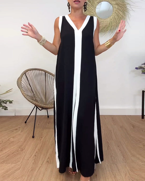 Sort kjole uden ærmer med kontrasterende hvide kanter