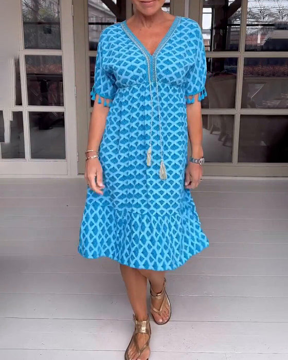 Mønstret kjole med V-udskæring og frynser