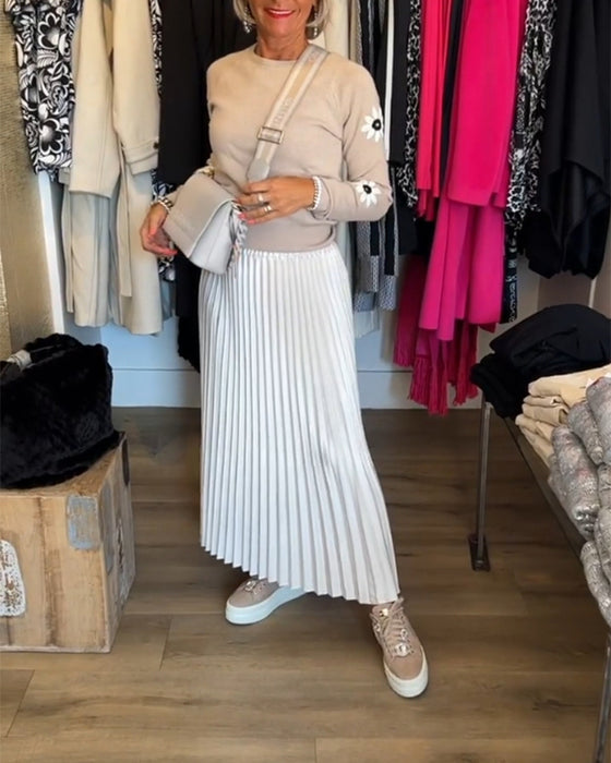 Plisseret ensfarvet kjole