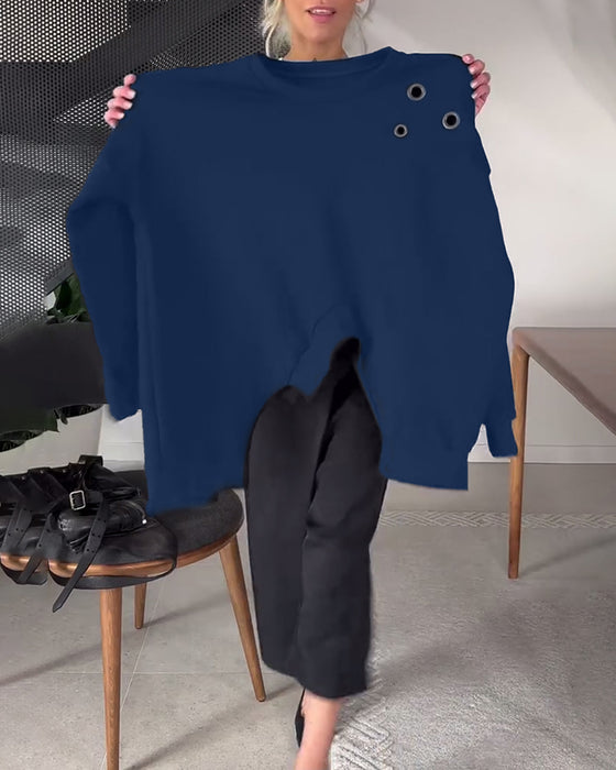 Sort sweater i løs pasform med slids