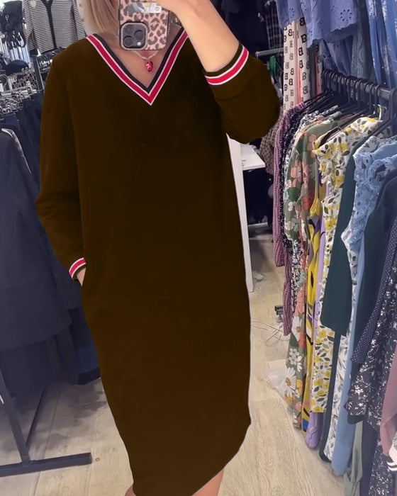 V-halset kjole med lommer