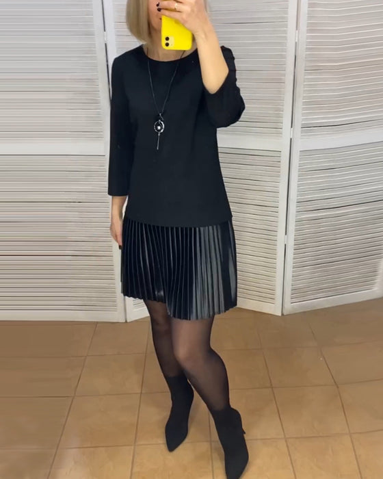 Kjole med plisserede paneler