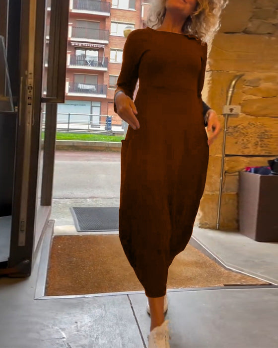 Langærmet sort kjole med lommer