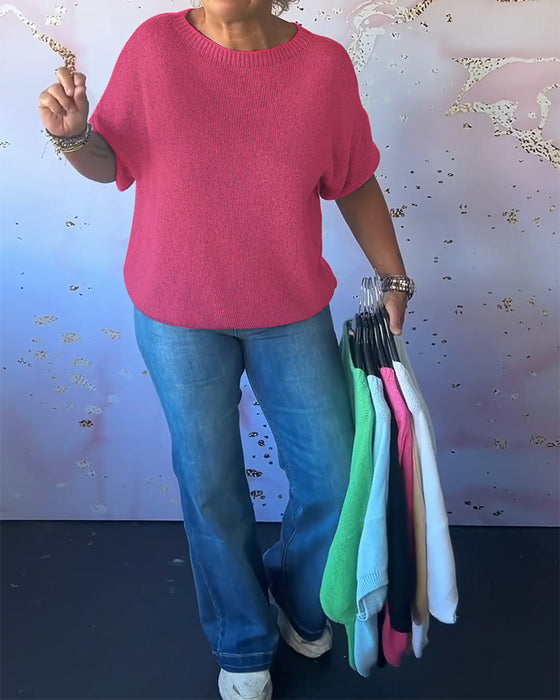 Løs ensfarvet pullover med rund hals