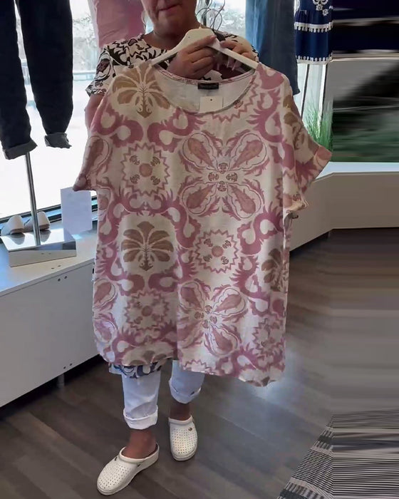 Afslappet blomsterbluse med rund hals