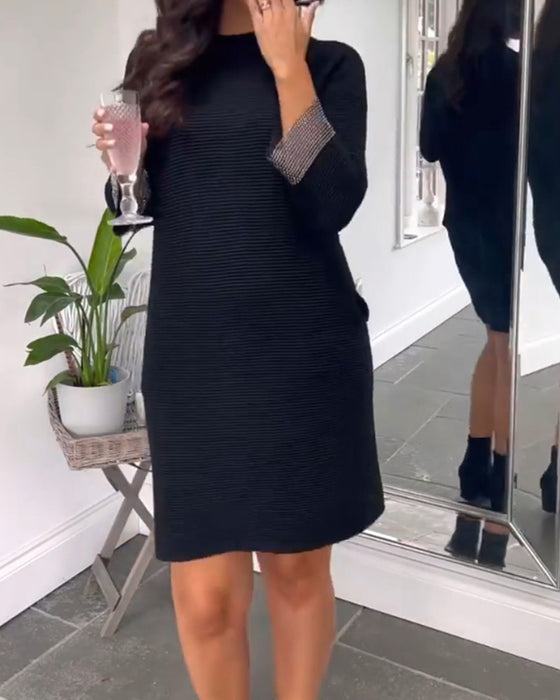 Elegant kjole med rund hals