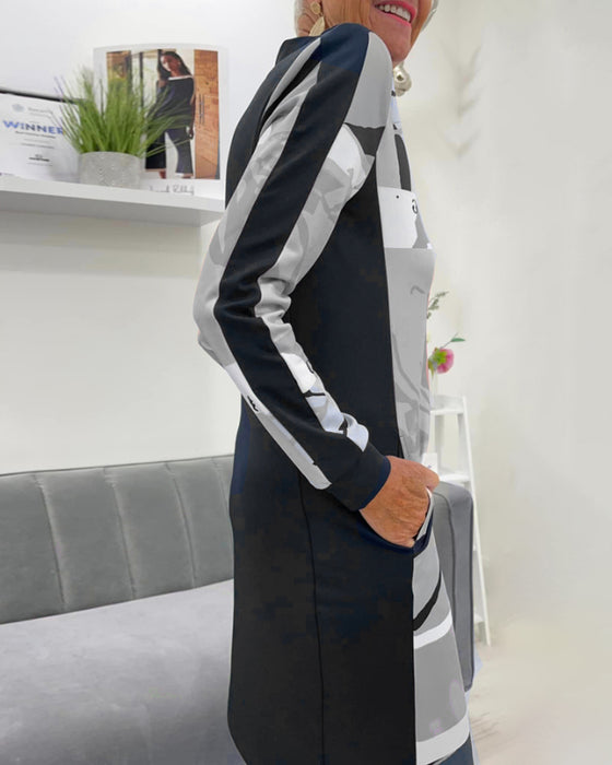 Langærmet kjole med farveblok og lynlås