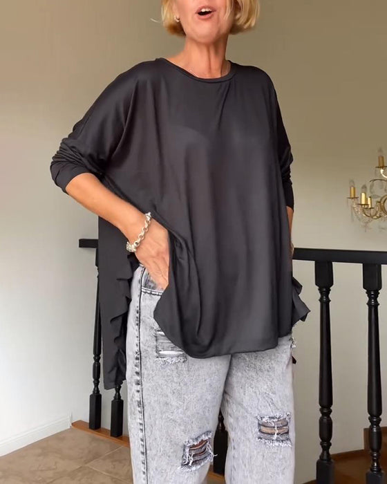 Ensfarvet plisseret bluse med rund hals