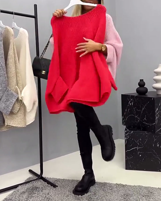 Stilfuld rød sweater i løs pasform med flagermusærmer