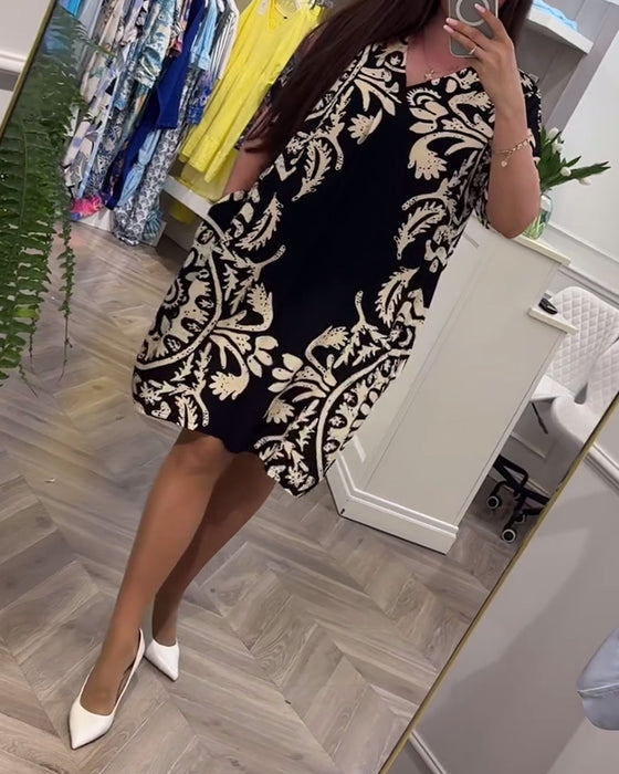 Knælang kjole med retro print