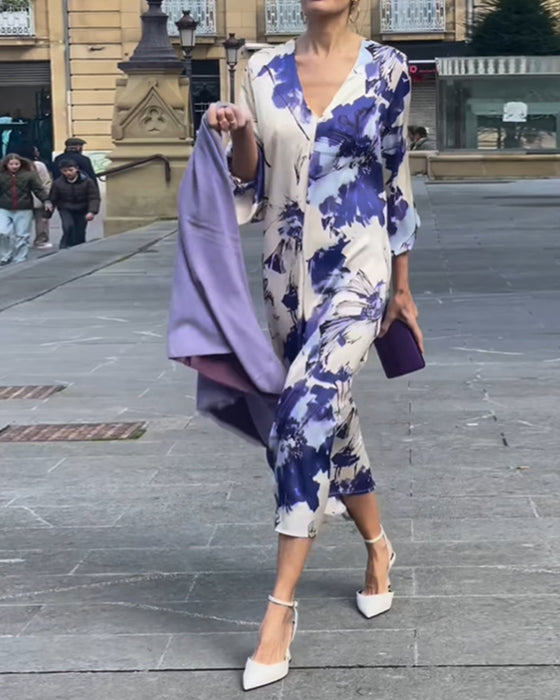 Elegant kjole med V-udskæring og print