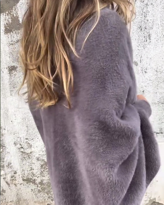 Pelsfrakke med frynser