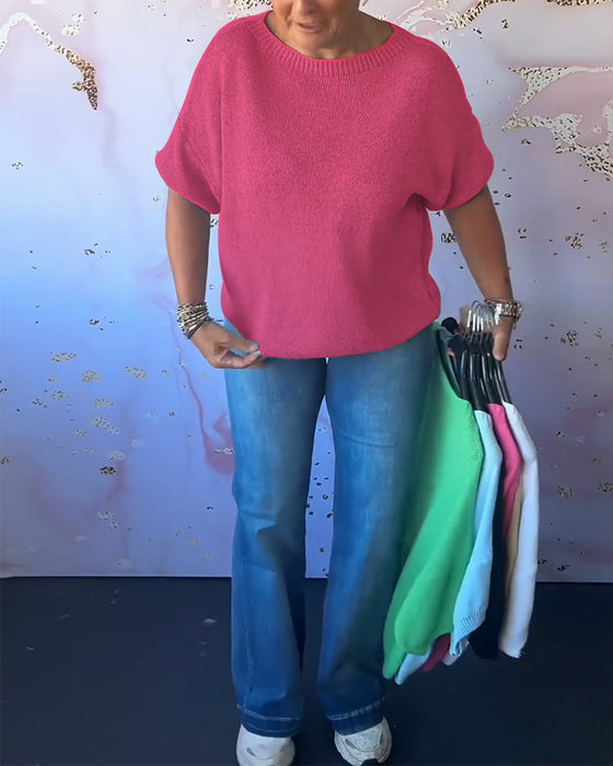 Løs ensfarvet pullover med rund hals