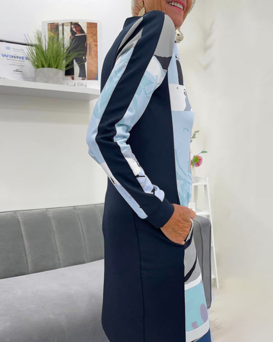 Langærmet kjole med farveblok og lynlås