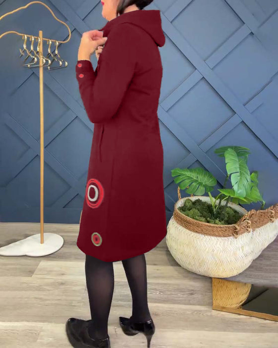 Afslappet kjole med hætte og cirkelprint