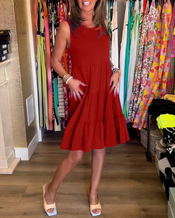 Blå ærmeløs kjole med plisseret nederdel