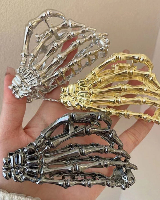 Hårklemme med skelethånd