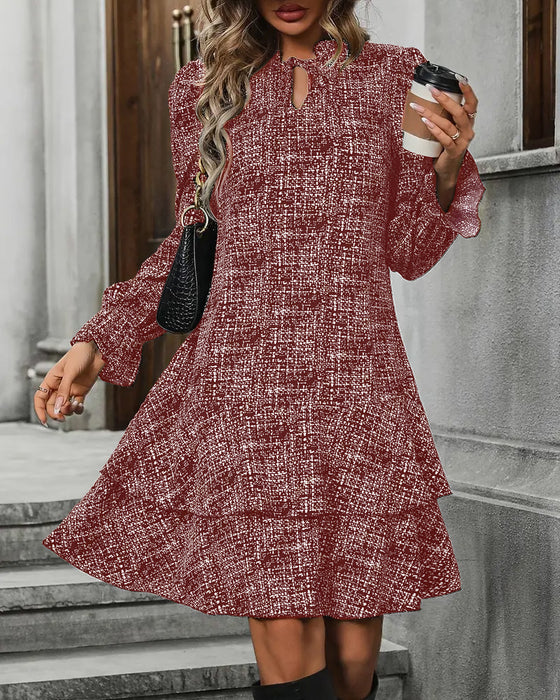 Elegant Kjole Med Flagrende Ærmer Og Striber