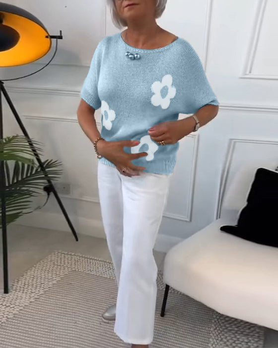 Slim fit striktrøje med rund hals og blomstermotiver