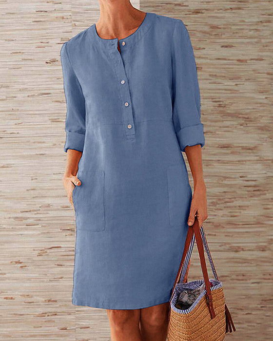 Elegant ensfarvet kjole