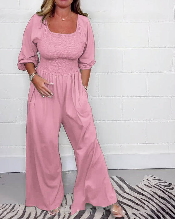Ensfarvet jumpsuit med firkantet hals