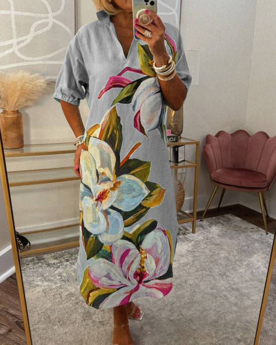 Kjole i løs pasform med stort blomstermotiv