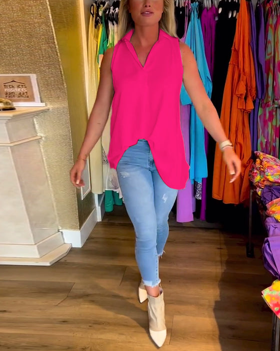 Ærmeløs top med flæser og reverskrave