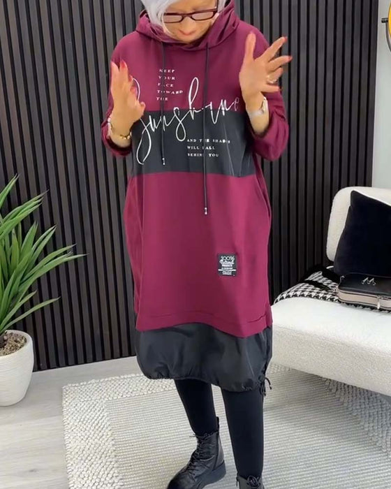 Afslappet hættekjole med skift