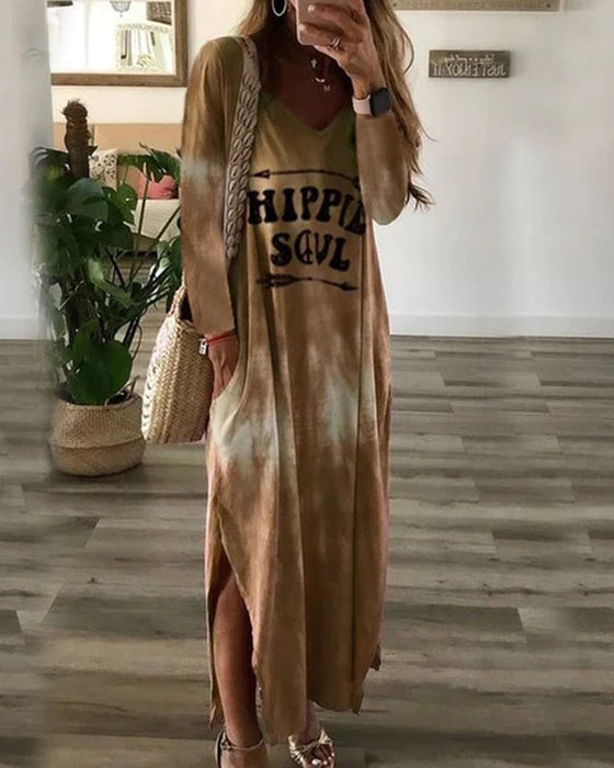 V-halset kjole med lomme og sidesnit