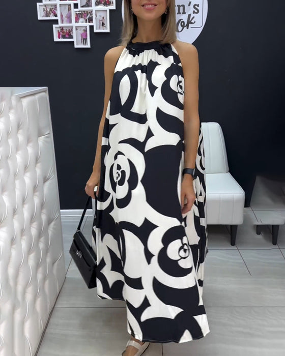 Sort-Hvid kjole med elegant designerprint