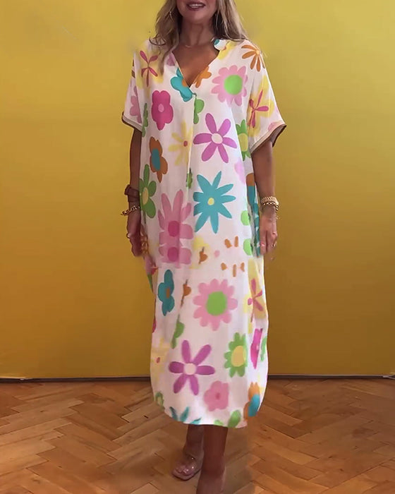 Sød blomsterkjole i løs pasform