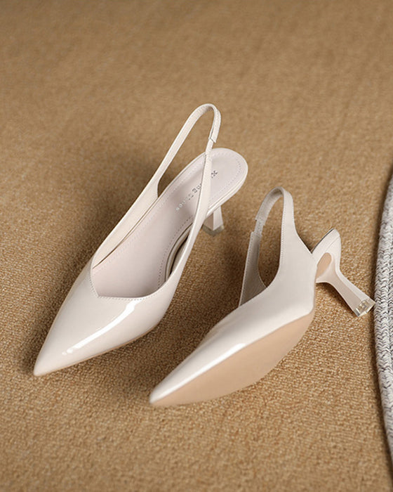 Ensfarvede høje hæle med spids tå og hælstrop