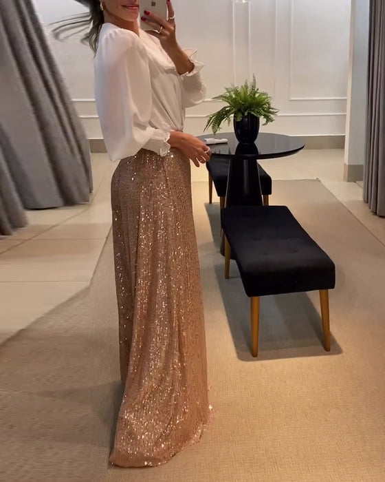 Elegant ensfarvet sommerbluse med lanterneærmer og V-udskæring