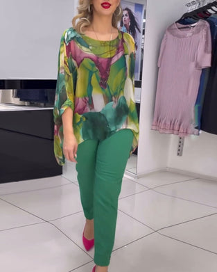 Rundhalset bluse med print og flagermusærmer