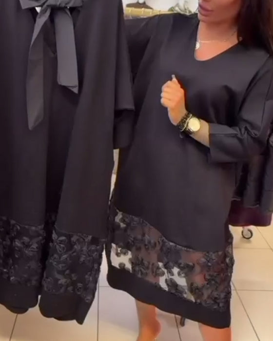 Stilfuld Kjole Med Sløjfe På Bagsiden Og V-Hals