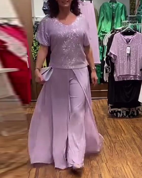 V-halset kortærmet bluse med pailletter