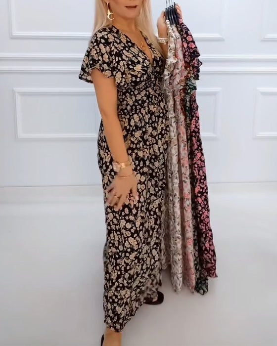 Kjole med afslappet blomsterprint og v-hals