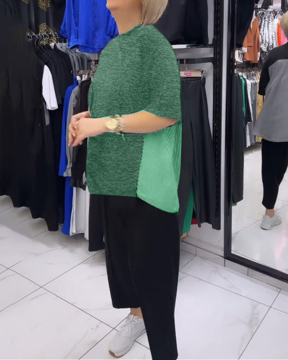 Afslappet sort bluse med nålestribet ryg