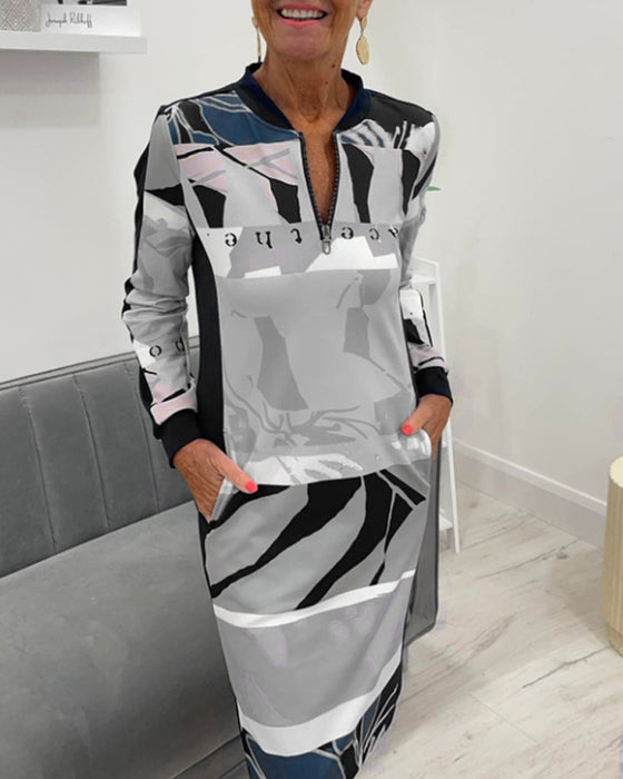 Langærmet kjole med farveblok og lynlås