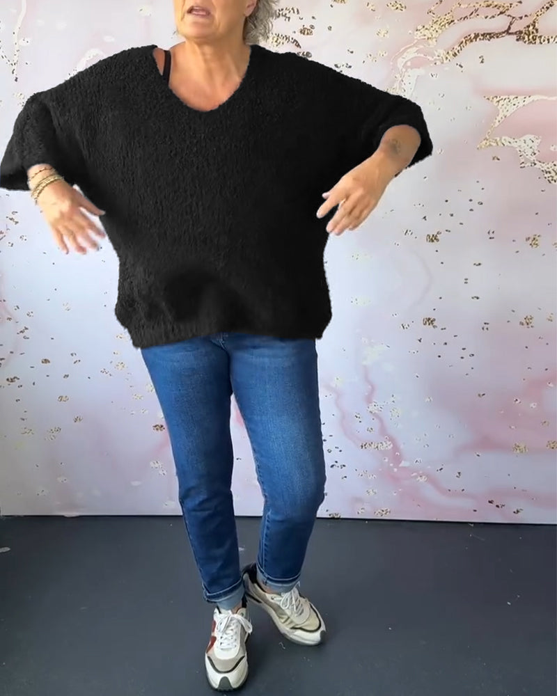 Ensfarvet sweater i løs pasform