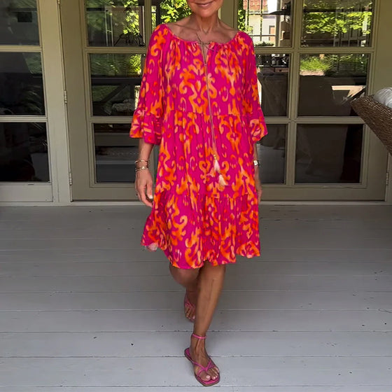 Rød kjole med print og trekvarte ærmer