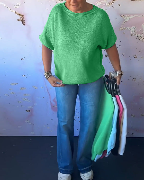 Løs ensfarvet pullover med rund hals