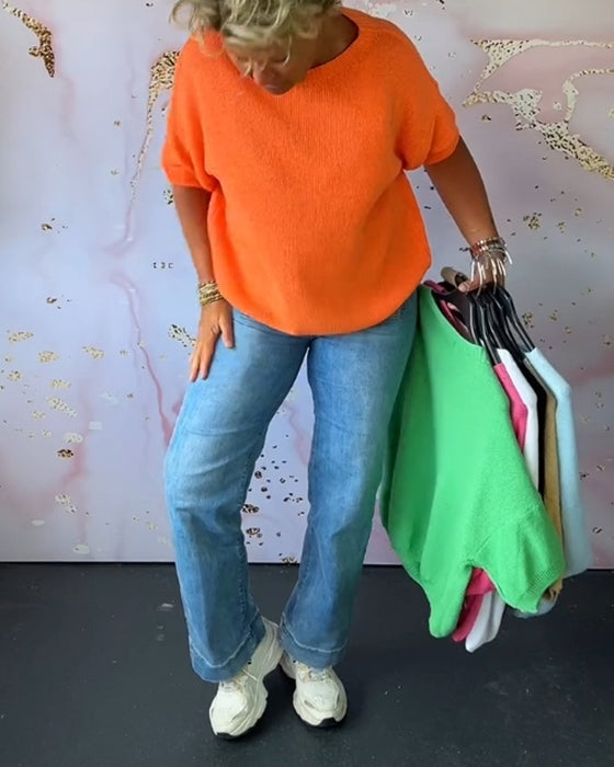 Løs ensfarvet pullover med rund hals