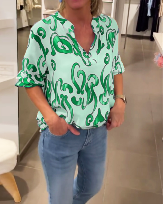 Elegant V-halset top med print